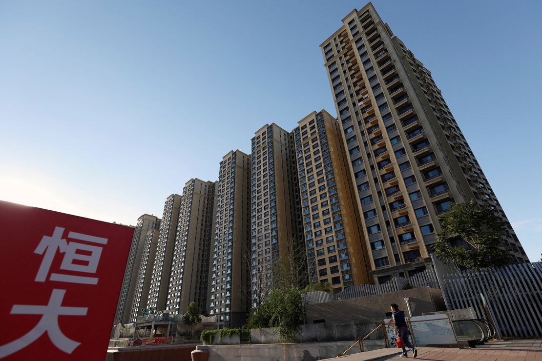 An Evergrande sign is seen near residential buildings at an Evergrande c, China September 27, 2023.