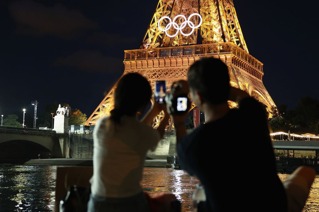 The Eiffel Tower is decorated with the Olympic rings on July 21, 2024 in Paris, France. The city is gearing up to host the XXXIII Olympic Summer Games from July 26 to Augusst 11.