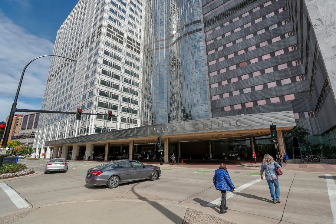 People enter the main entrance of the Mayo Clinic in Rochester, Minnesota, on September 29, 2020.