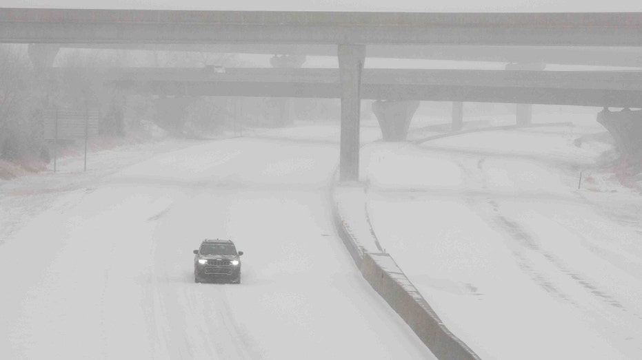 blizzard condition on roadway